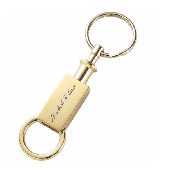 Perfect for keeping your house keys with you when having a valet park your car, this valet key ring has two separate round key holders which detach from each other. They are connected in the middle with a gold plated, rectangular centerpiece that is ideal for adding some free engraving. A popular inscription choice is the initials of the recipient but you can get as creative as you'd like. This personalized valet key ring comes packaged in a gift box, a unique, thoughtful gift for someone special. PRODUCT INFORMATION Polished gold plated valet key ring Free engraving Dimensions: 3 3/4" x 1 1/8" Comes packaged in a gift box