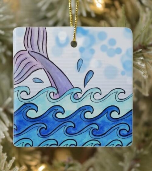 Moby Dick inspired square shaped ornament that features the tail of a whale and blue waves