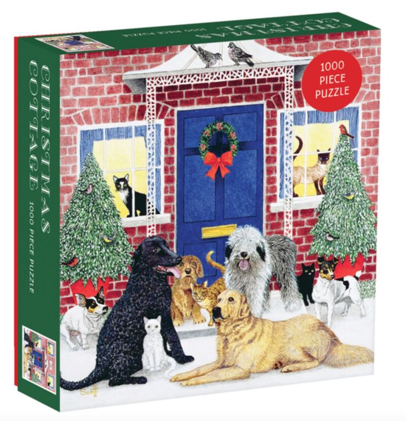 puzzle depicts a cozy Christmas cottage and pet dogs and cats