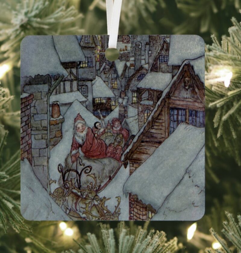 Square shaped ornament of Saint Nick on a sled for a white Christmas